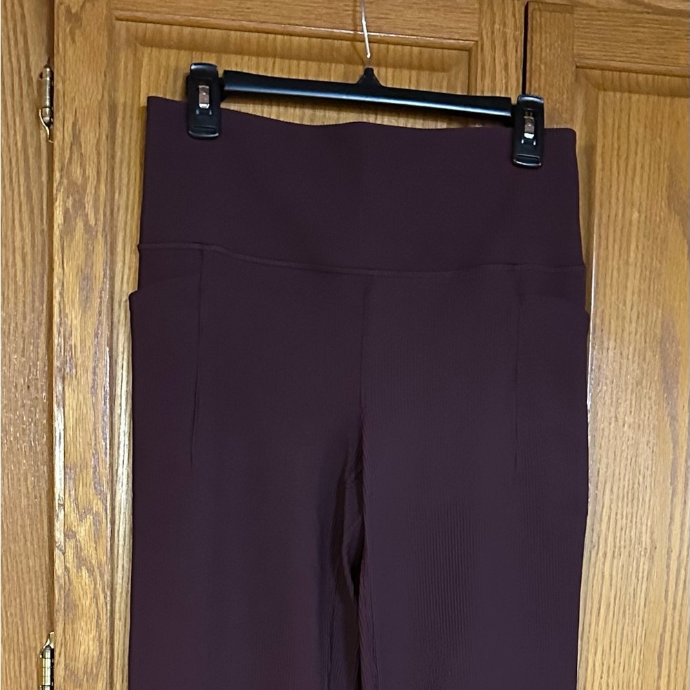 Athleta Wine Burgundy 6 Tall Salutation Stash rib flare - excellent condition